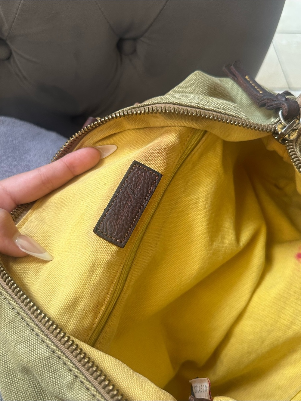 Dooney & Bourke Olive Canvas Duffel with Brown Leather Trim - Picture 13 of 15